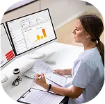 Woman working on home desktop computer